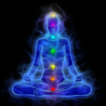 Human energy body blue aura coloured chakras in meditation